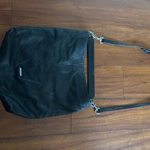 Rebecca Minkoff, black leather purse with tassels with 2 length straps.